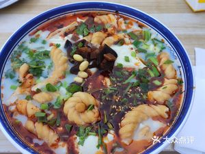 Lao Gu Douhua Soup Dumplings (Zhangjiabao New Area Store)