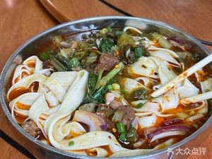Yi Jia Yuan Niu Cai Guan