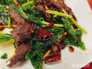 Qing Zhen Xiang He Niu Cai Guan