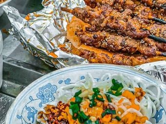 Xinjiang Brothers Selling Lamb Skewers