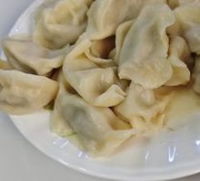 Freshly Wrapped Pork and Scallion Dumplings