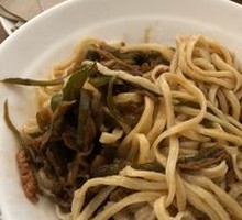 Stir-fried eggplant with pepper and shredded pork in noodle soup