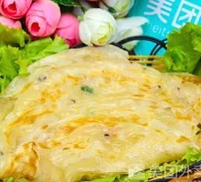 Hand-held pancake with egg