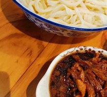 Stir-fried eggplant with pepper and shredded pork in noodle soup