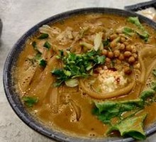 Handmade Wide Rice Noodles in Spicy Sour Sauce