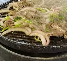 Grilled Meat on Iron Skillet