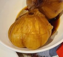 Traditional Pickled Garlic in Fermentation Jar