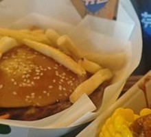 Cheeseburger with BBQ sauce and fries