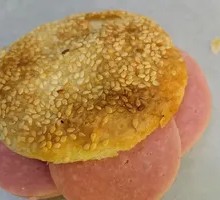 Braised flatbread with sausage