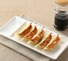 Wok-Style Pork Dumplings with Sauce