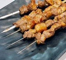 Lamb Skewers on Iron Rods