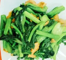 Preserved pork stir-fried with red mustard greens