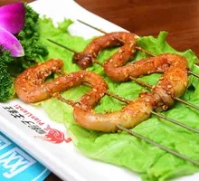 Charcoal-grilled lamb penises