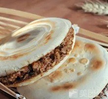 Well-done meat-filled flatbread