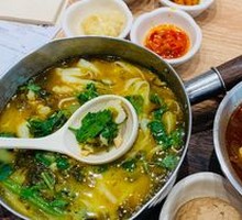 Spicy Sour Fish Noodles in Golden Soup