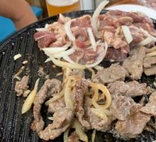 Grilled Meat on Iron Skillet