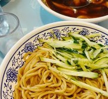 Hand-extruded noodle soup