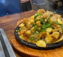 Sizzling Frog Legs