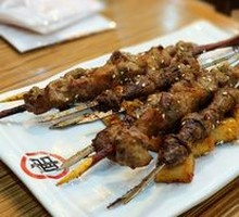 Lamb Skewers on Red Willow Branches