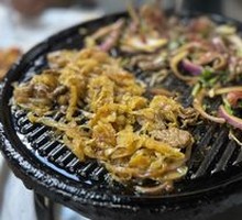 Grilled Meat on Iron Skillet
