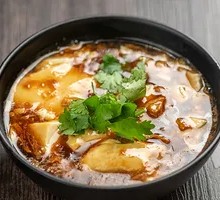 Sauce-drenched Tofu Pudding