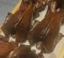 Grilled Pigeon in Aluminum Foil