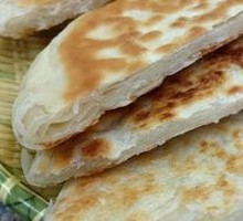 Pork head meat wrapped in烙饼