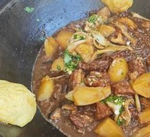 Stewed Pork Ribs and Chicken Feet in Iron Pot