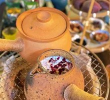 Tea Boiled by a Hearth