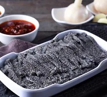 Freshly Sliced Black Tofu Sheets
