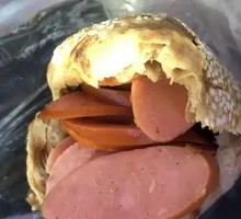 Braised flatbread with smoked sausage