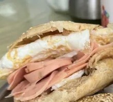 Baked flatbread with sausage and egg