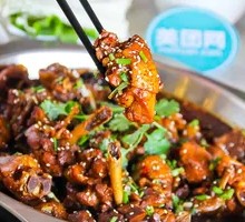 Stir-Fried Rooster in Iron Pot