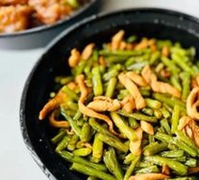 Stir-fried shredded pork with garlic shoots