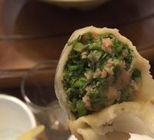 Pork and fennel steamed dumplings with pickled side dish