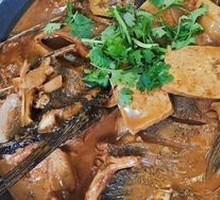 Signature Fish Head with Flatbread