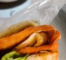 Braised Pork Chop with Egg in Flatbread