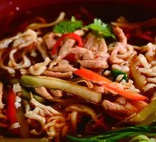 Pickled mustard greens with pork stir-fried knife-cut noodles