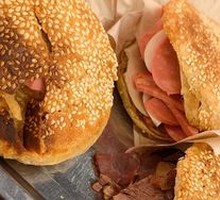 Braised flatbread with sausage