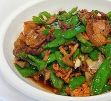 Spicy Hunan-style pork stir-fry with local chili