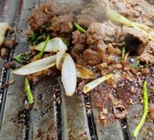 Grilled Meat on Iron Skillet