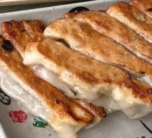 Pork and Napa Cabbage Dumpling Skillet