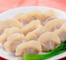 Handmade Pork and Scallion Dumplings