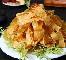Oil-soaked tofu skin