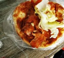 Egg-filled pancake with pork tenderloin