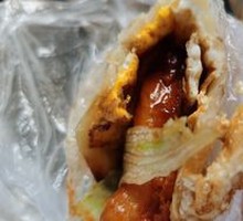 Egg-filled pancake with chicken cutlet