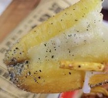 Oil-fried dough wrapped in rice cake