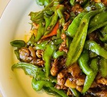 Spicy Pork Stir-fry with Local Flavor