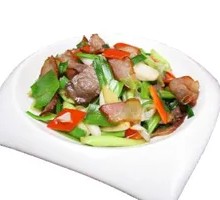 Stir-fried腊肉 with green garlic shoots