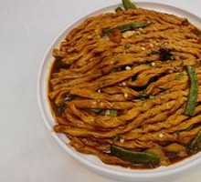 Pork ribs with potato, green beans, and corn cakes